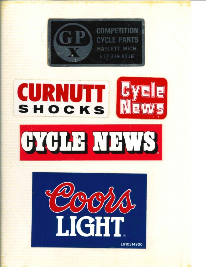 A collection of stickers with the words cycle news and coors light.
