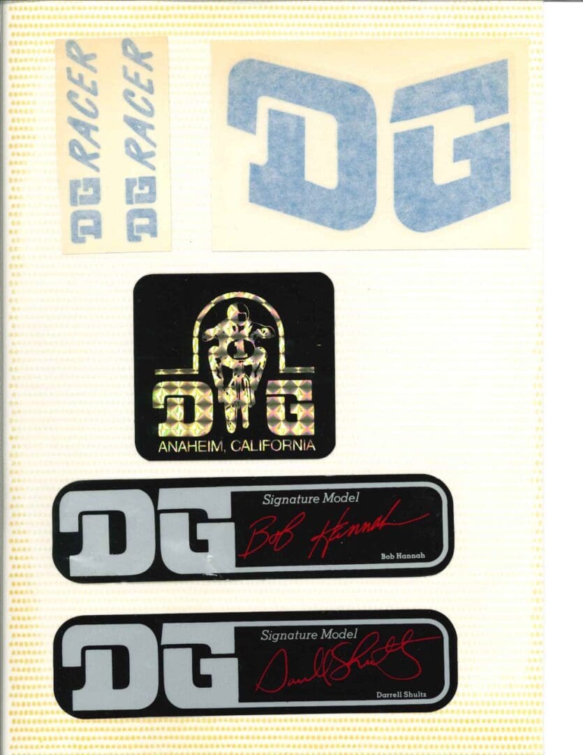 A set of stickers with the dg logo on them.