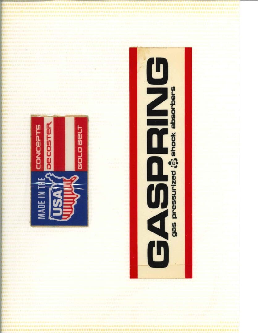 A sticker with the words gas springs and a usa flag.