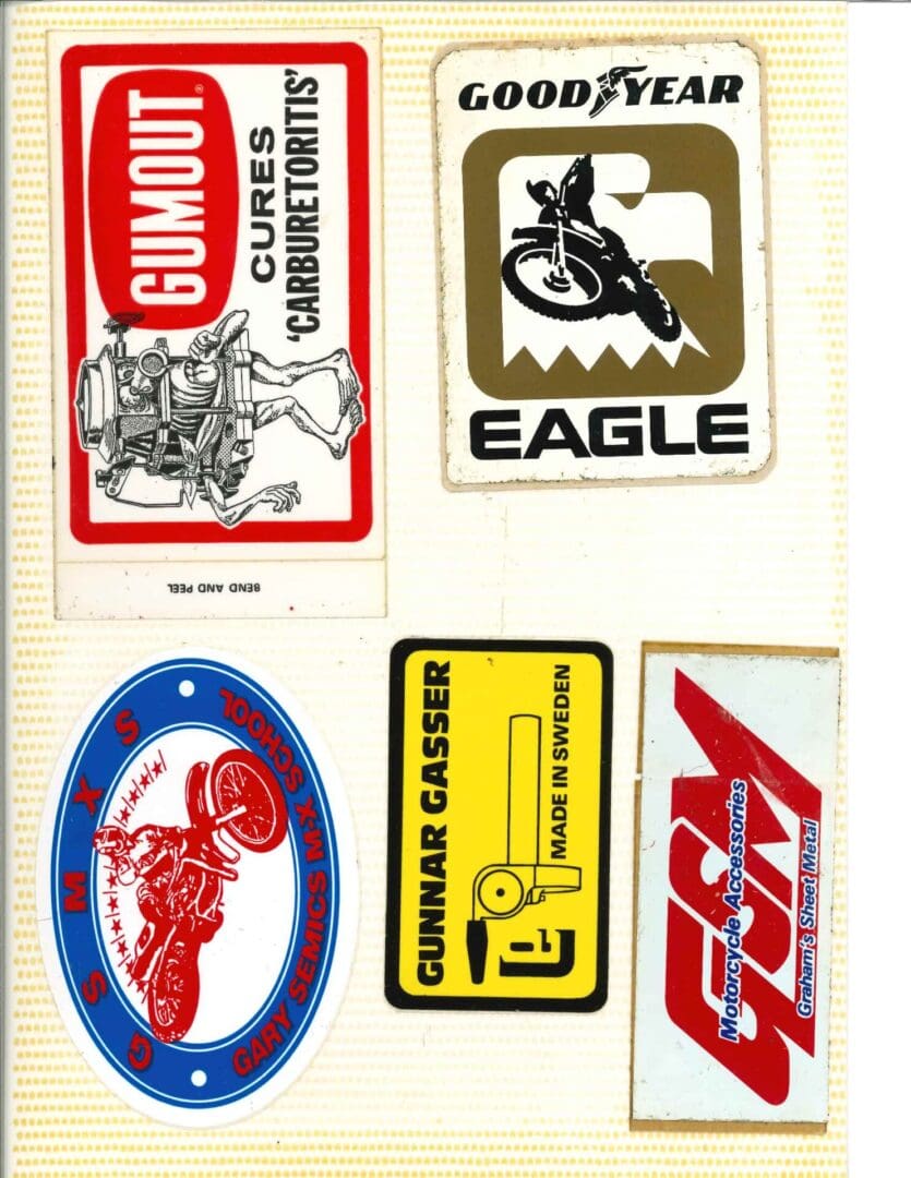 A collection of motorcycle stickers on a white background.