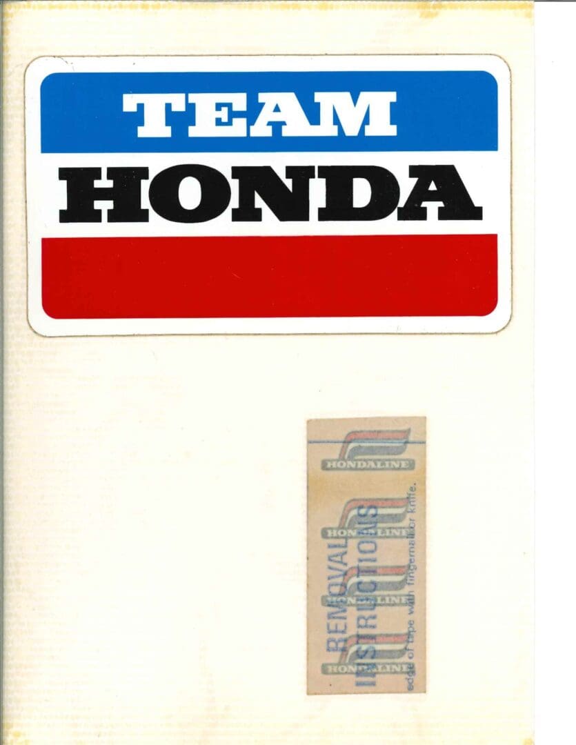A book with a team honda logo on it.