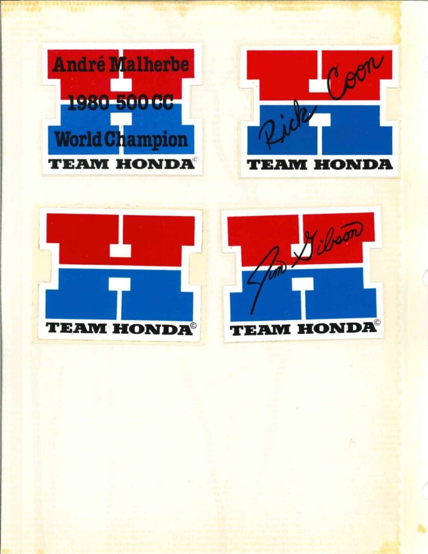 Four team honda stickers on a piece of paper.