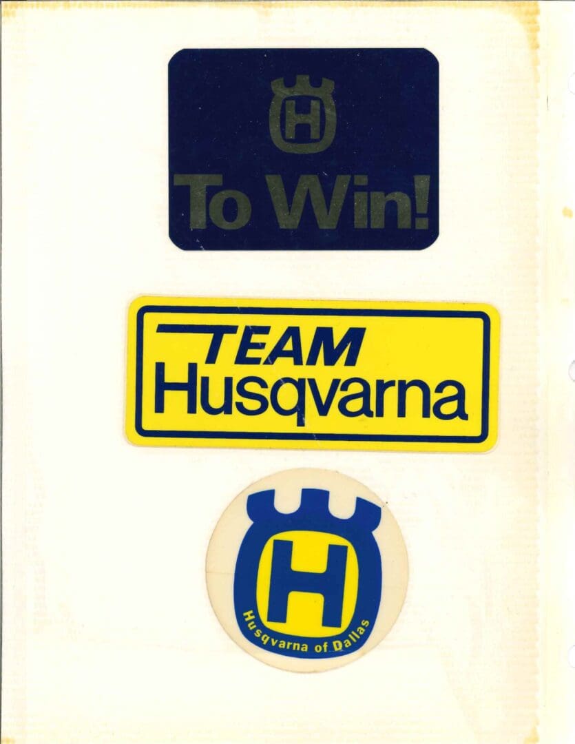 A team husqvarna sticker with the words to win.