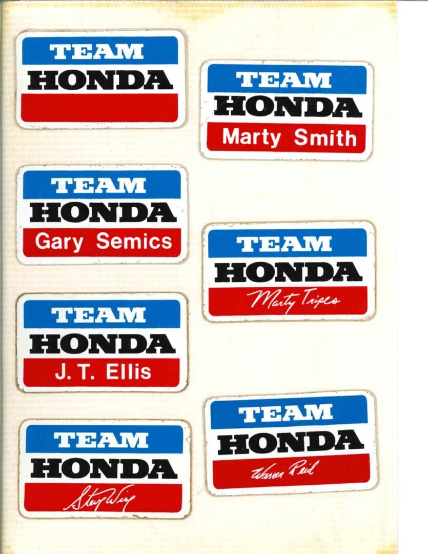 A group of team honda stickers on a white background.