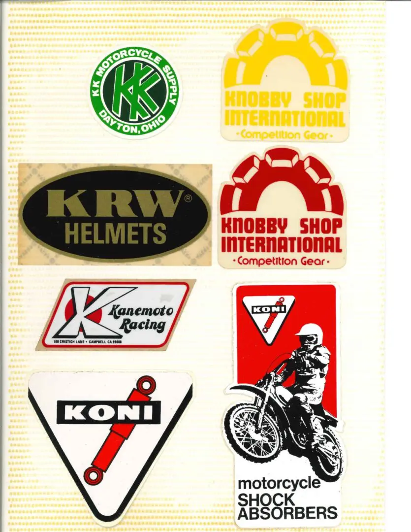 A group of motorcycle stickers on a white background.
