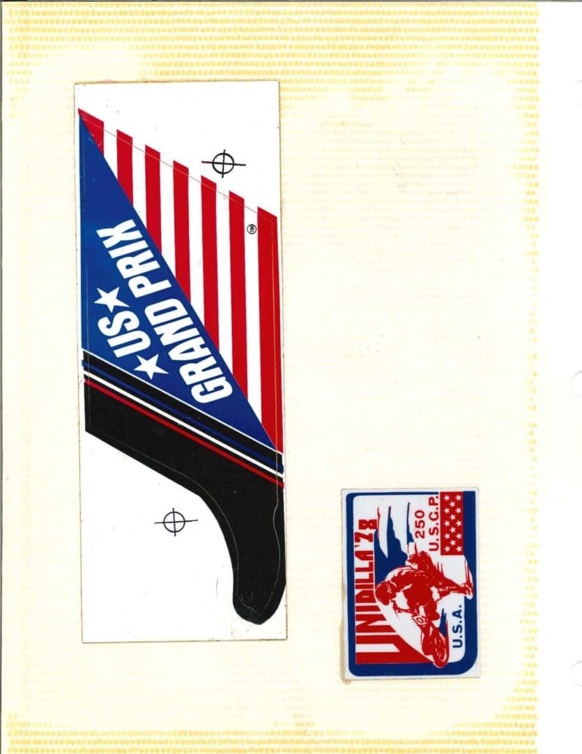 A piece of paper with an american flag and a sticker.